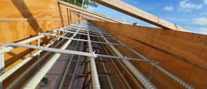 Reinforcing steel bars in wooden concrete formwork