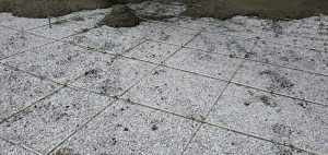 Wire mesh grid over gravel before concrete